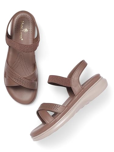 Brown flat sandals with crisscross straps, cushioned sole, open toe design, and textured detailing, offering comfort and casual everyday style.